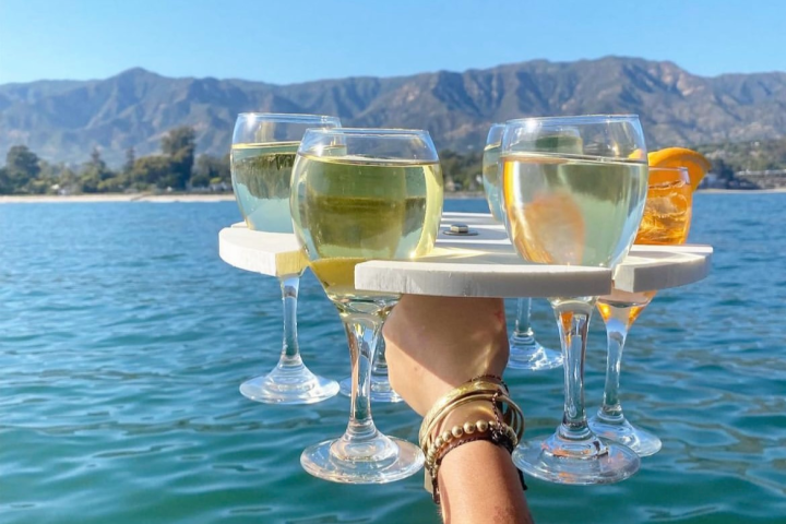 a man holding a glass of water