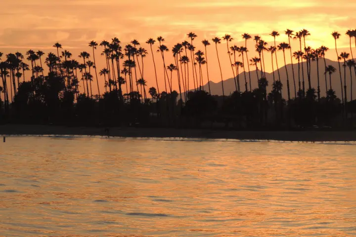 a sunset over a body of water